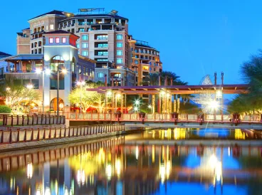 Waterfront promenade lit up at night
